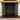 Smooth black brick slips clad a fire chamber in a herringbone pattern, with the sides and pillars in a stretcher bond, with an oak beam above.