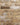 Close-up of brick slips with a variety of brown and beige bricks.