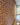 A classic red brick slip feature wall with white mortar runs left to right.