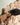 A 10mm brick slip spacer being added to a wall of brick slips.