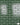 Dark Green Glazed brick slip panel with grey mortar