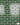 Dark Green Glazed brick slip panel with cream mortar